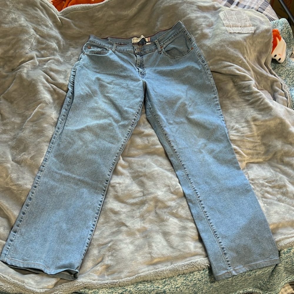 Levi’s jeans, buttons and little loose